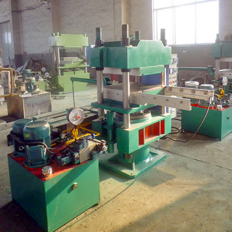 120噸四柱帶強(qiáng)制開模硫化機(jī)自動(dòng)推拉平板硫化機(jī)