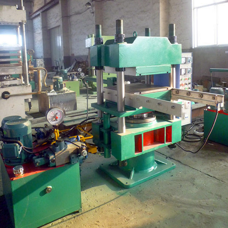 120噸四柱帶強(qiáng)制開模硫化機(jī)自動(dòng)推拉平板硫化機(jī)